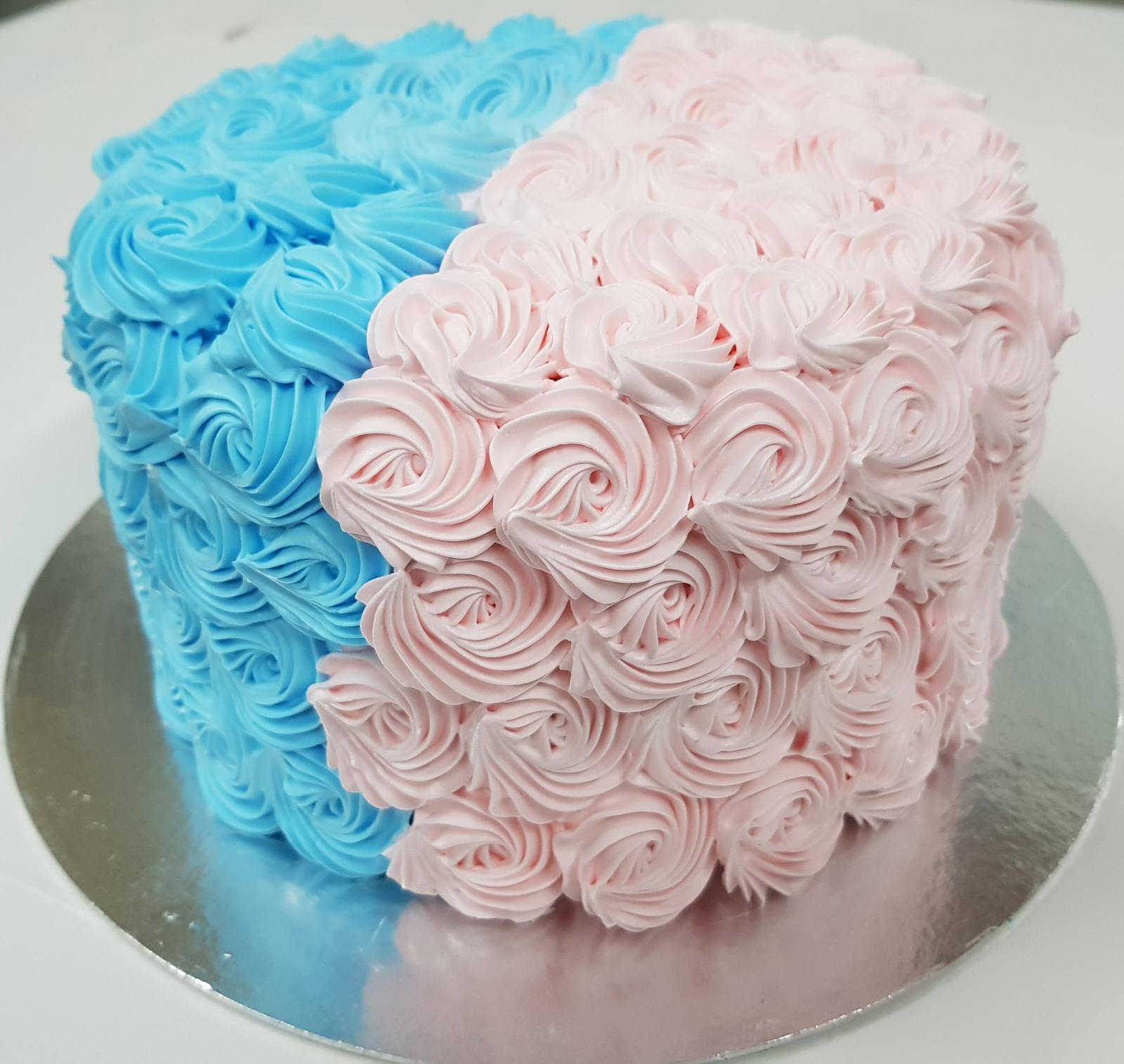 MoMa Cakes - Pink and blue buttercream rosettes cake to... | Facebook
